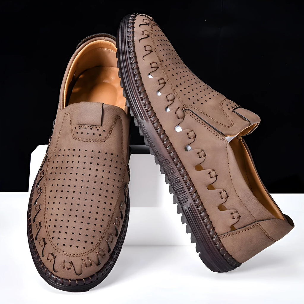 Men's brown slip-on casual shoes with round toe and visible sewing construction on artificial PU upper