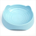 Ceramic dog slow feeder bowl with raised maze pattern in blue, green, or pink colours