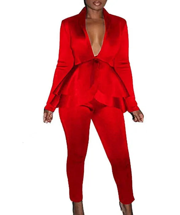 Women's white polyester business suit with ruffled sleeve detail and matching pencil pants.