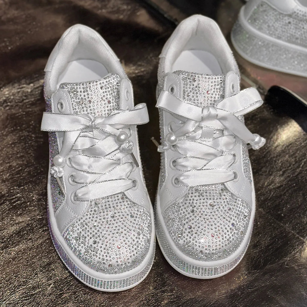 Solid white plus size women's casual shoes with starry rhinestone detailing, low-top design, and rubber sole