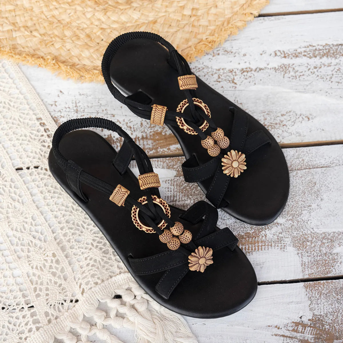 Black women's ethnic style flat sandals with beaded weave pattern and elastic band