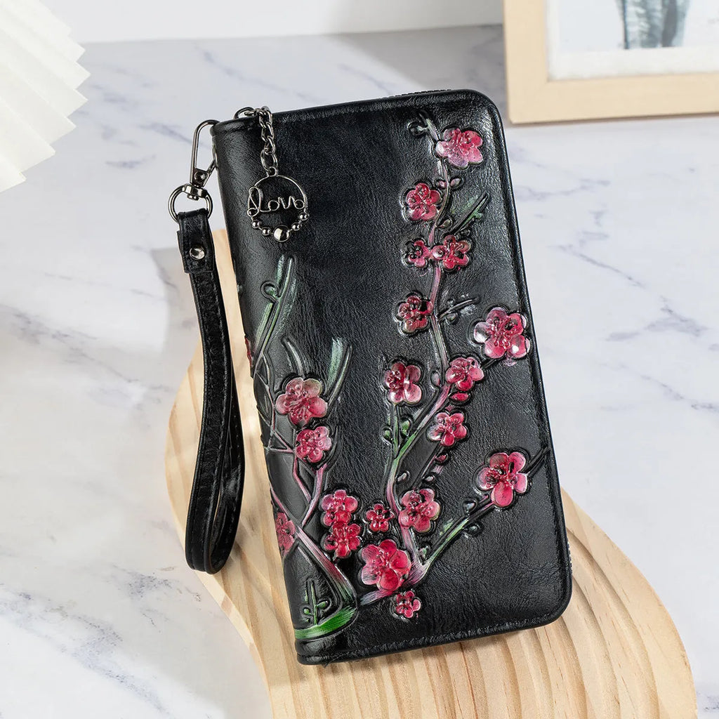 Embossed floral Chinese style handbag in black with zipper closure
