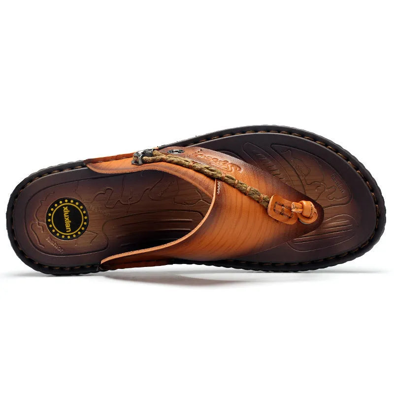 Men's dark blue herringbone pattern outdoor slippers with a rubber sole, shown in a large size.