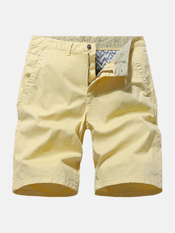 Men's loose fit denim shorts in a straight leg style with no belt, shown in a choice of colours.