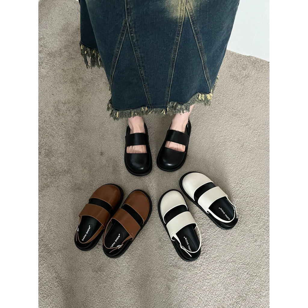 Korean style closed toe sandals with an ankle strap buckle in black, brown, and apricot colours.
