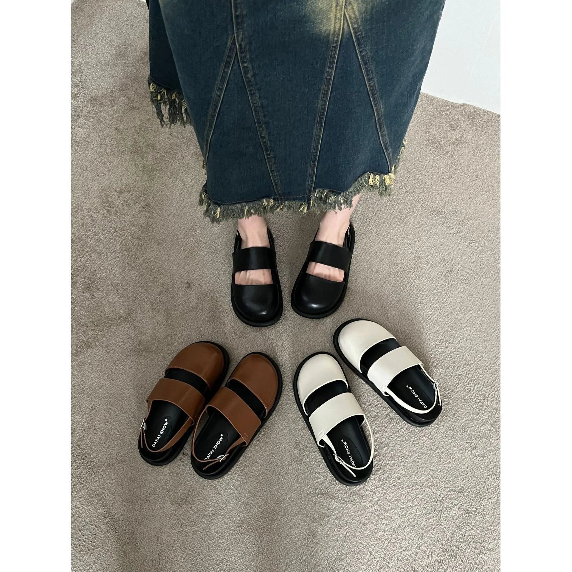 Korean style closed toe sandals with an ankle strap buckle in black, brown, and apricot colours.
