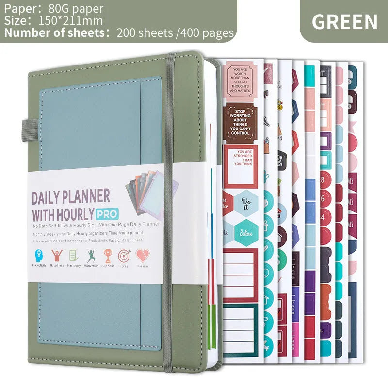 A6 self-filled notebook with PU cover in various colours, shown open on wooden table.
