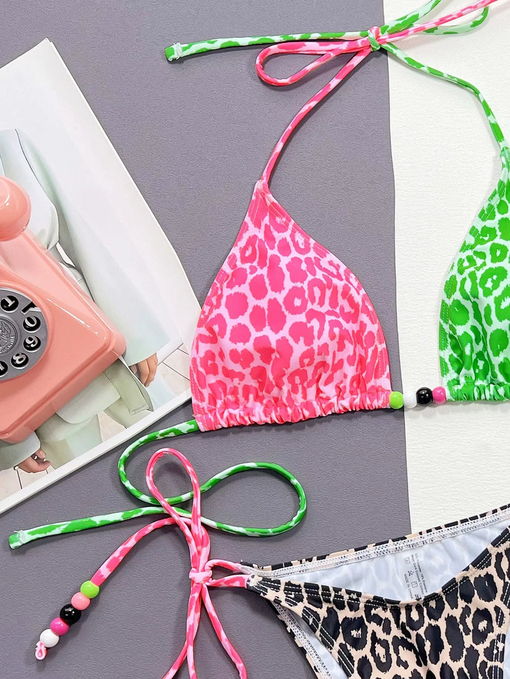 Leopard print women's bikini swimsuit with halter neck and high-cut briefs