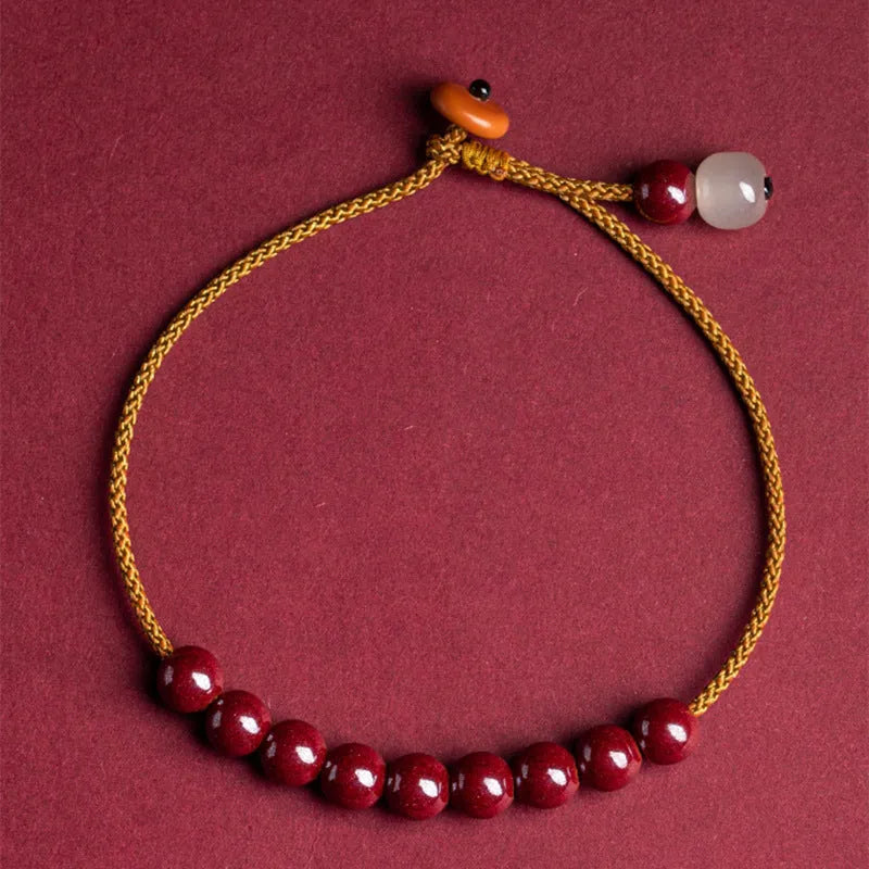 Hand-woven cinnabar bracelet with geometric beads in traditional Hetian jade style