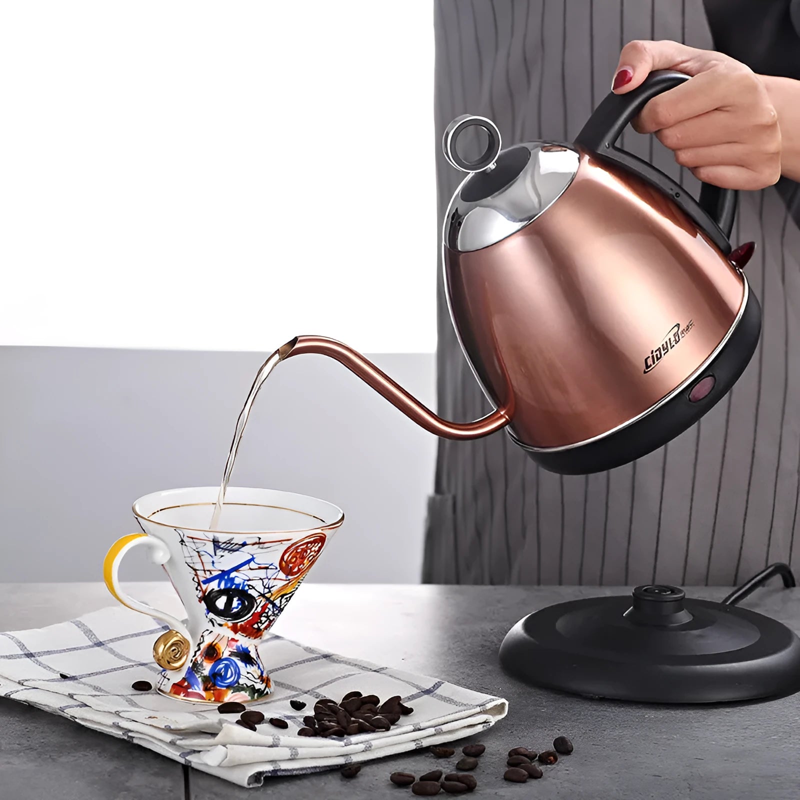 Gold automatic stainless steel kettle with touch control panel and 1 litre capacity
