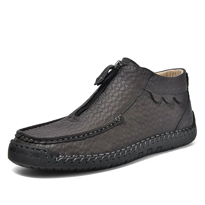 Men's black slip-on casual loafers with round toe and rubber sole on a white background.