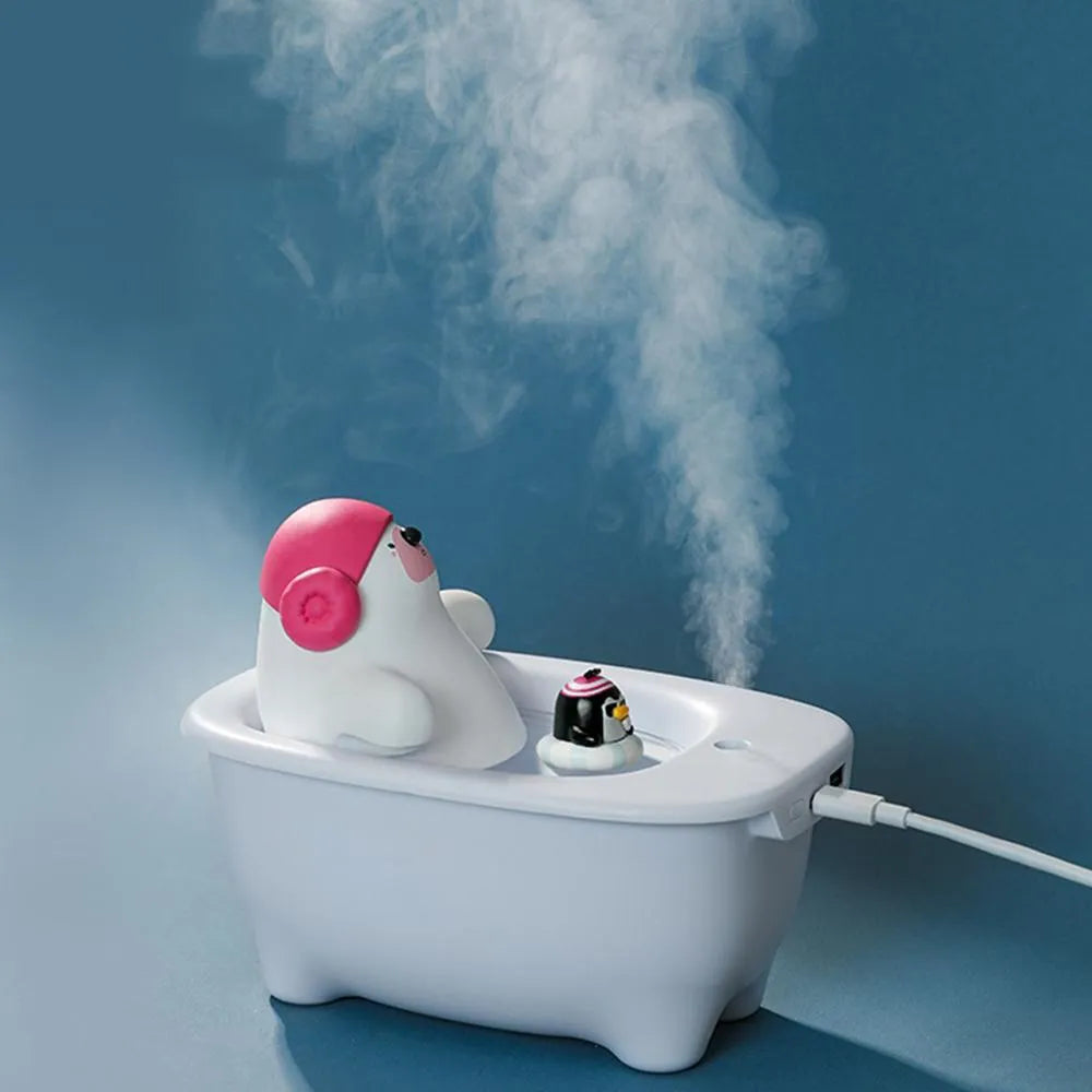 White USB desktop humidifier with 550ml water tank on wooden desk