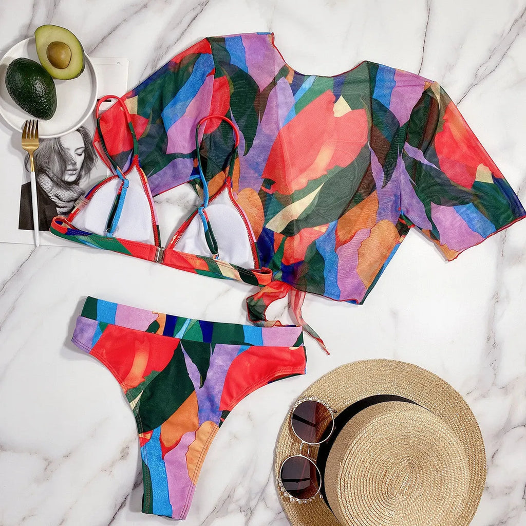 Red women's split swimsuit with printed design for swimming and water sports