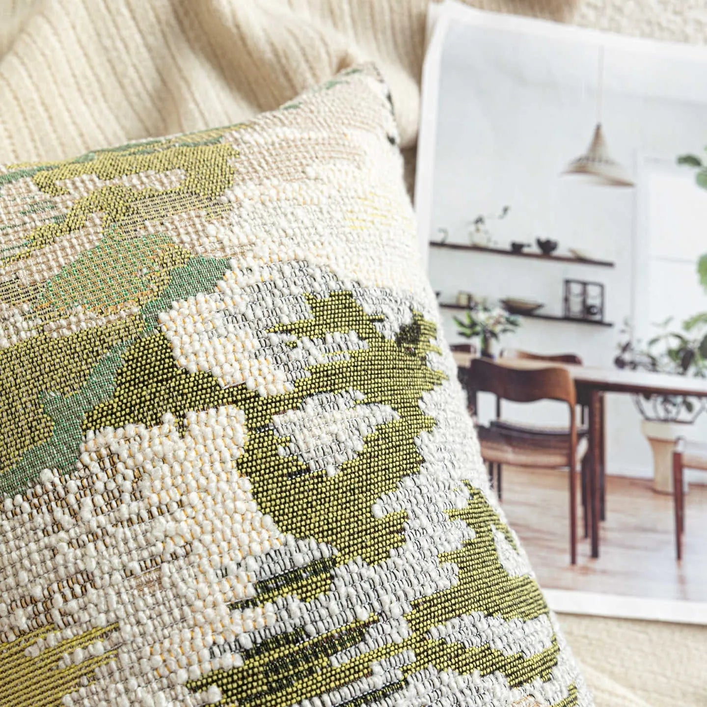 Green wool blend cushion with abstract French antique spring flower pattern, shown in square and rectangular sizes.