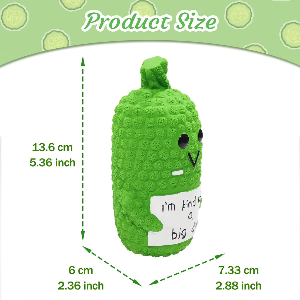 Green pickle-shaped squeaky dog toy with textured surface for teeth cleaning