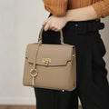 Elephant grey square genuine leather handbag with a vintage lock and textured litchi pattern.