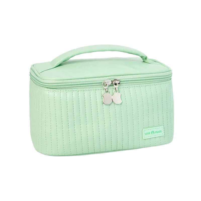 Open-top PU leather makeup bag shown in a pastel colour from the range of six options.