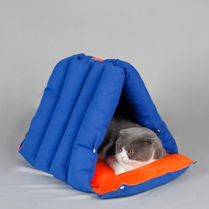 Blue triangular cotton cat nest bed with drilled holes for combination.
