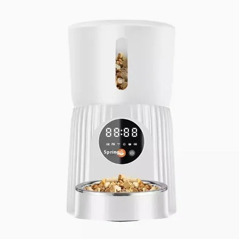 Black and white automatic intelligent pet feeder with digital display and food bowl.