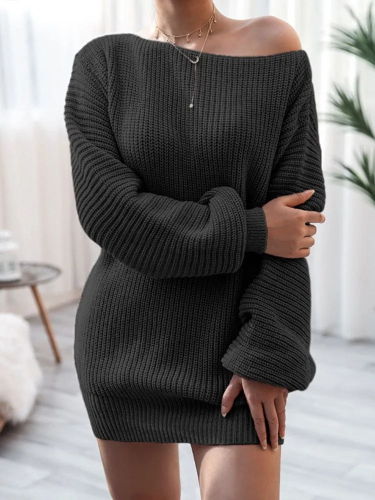 Women's off-the-shoulder knitted sweater dress with full lantern sleeves in a solid colour.