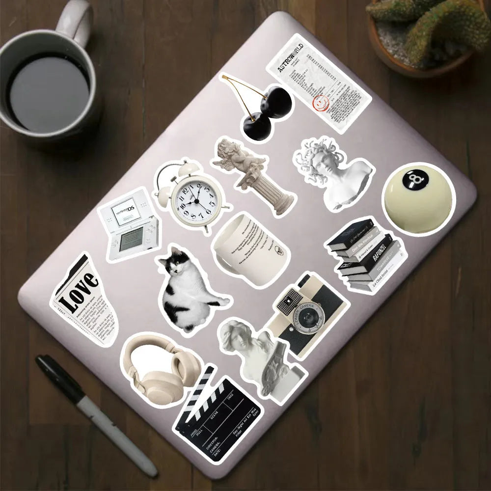 61 black and white PVC waterproof stickers for laptops, phones, and luggage customisation