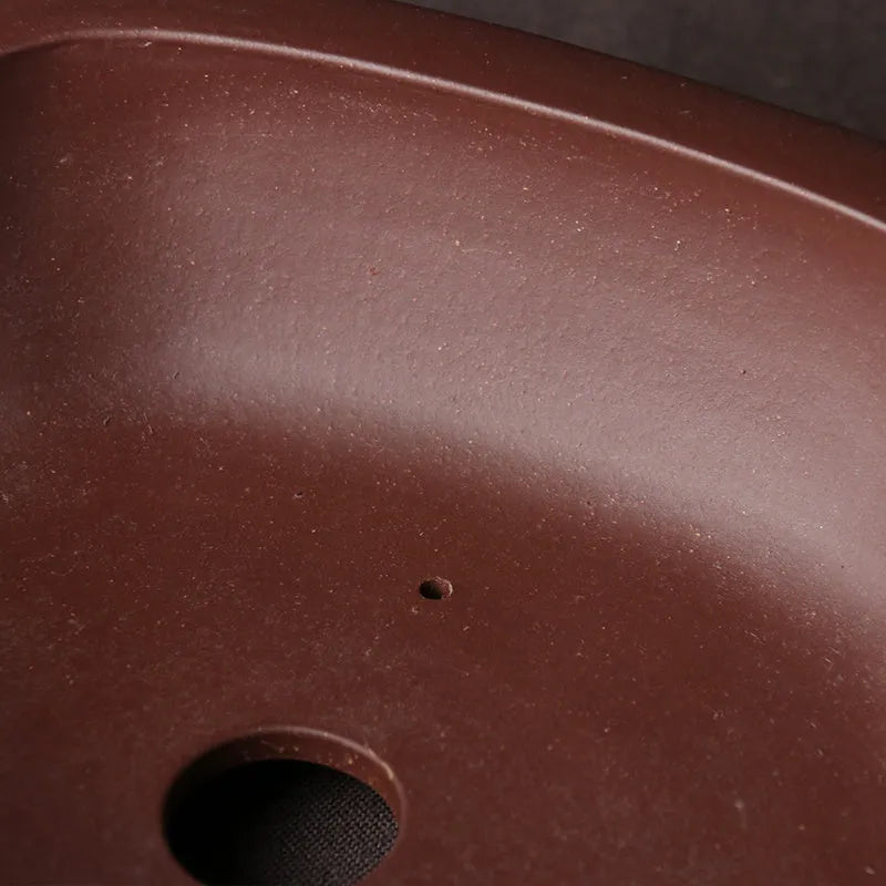 Handmade purple clay bonsai basin with classical Chinese design measuring 25cm long by 20cm wide