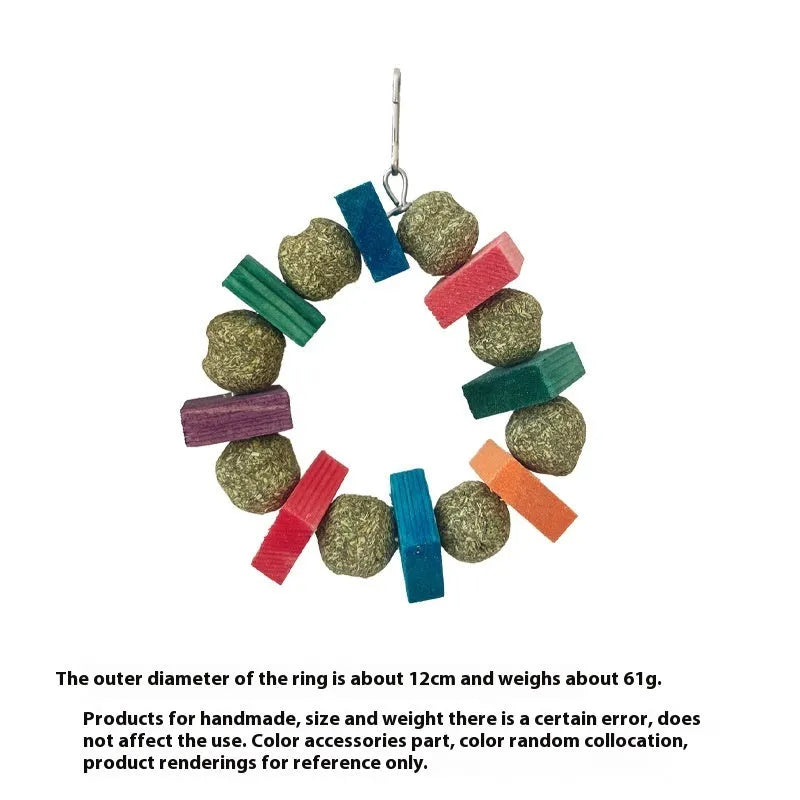 Hamster chew toy with decorative straw ball ring on wooden ring for small pets