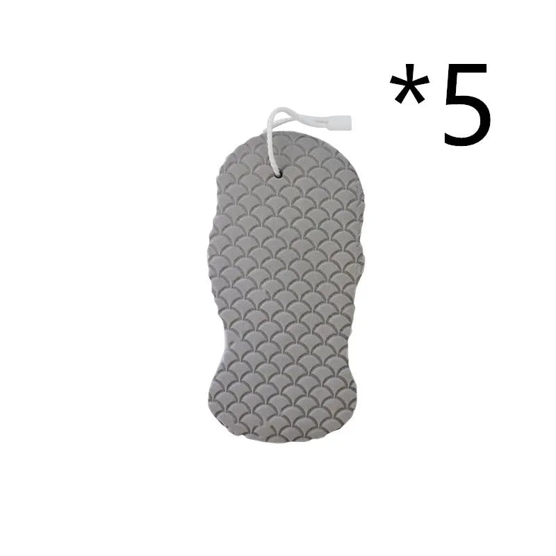 3D fish scale pattern bath sponge ball in assorted colours on a bathroom background.