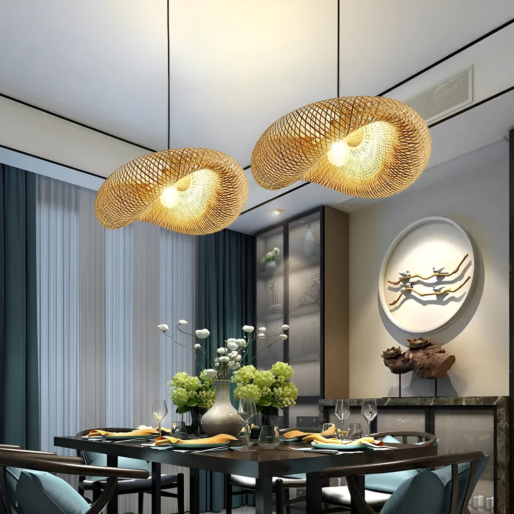 Handmade straw hat-shaped bamboo pendant chandelier hanging from a ceiling