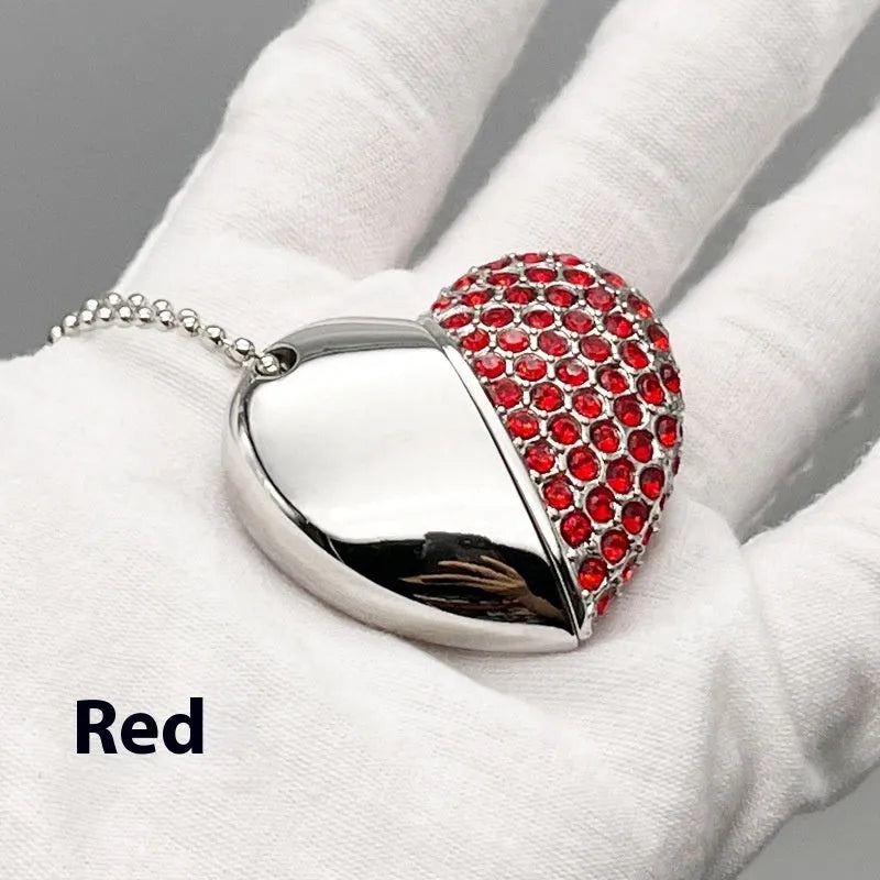 Heart-shaped metal USB flash drive with a brick pattern, showing colour options and USB connector.