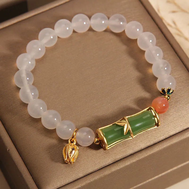 Women's Chinese style bamboo beaded bracelet with white agate jasper charm and natural jade materials