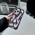 Electroplated hollow flame pattern design on a soft TPU iPhone case, shown in a silver finish.