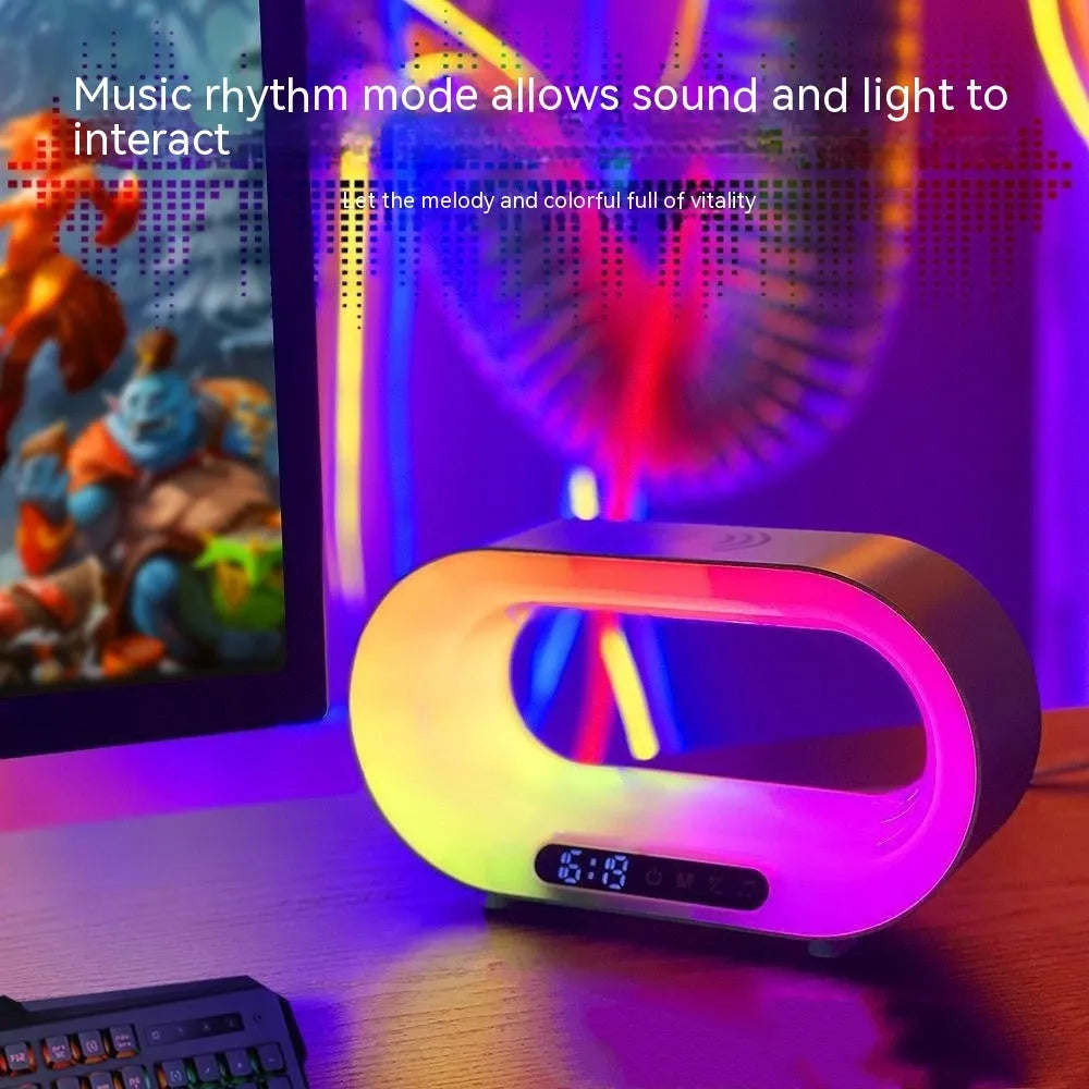 White 3-in-1 LED night light with wireless charger and alarm clock on a bedside table, 23.8cm tall