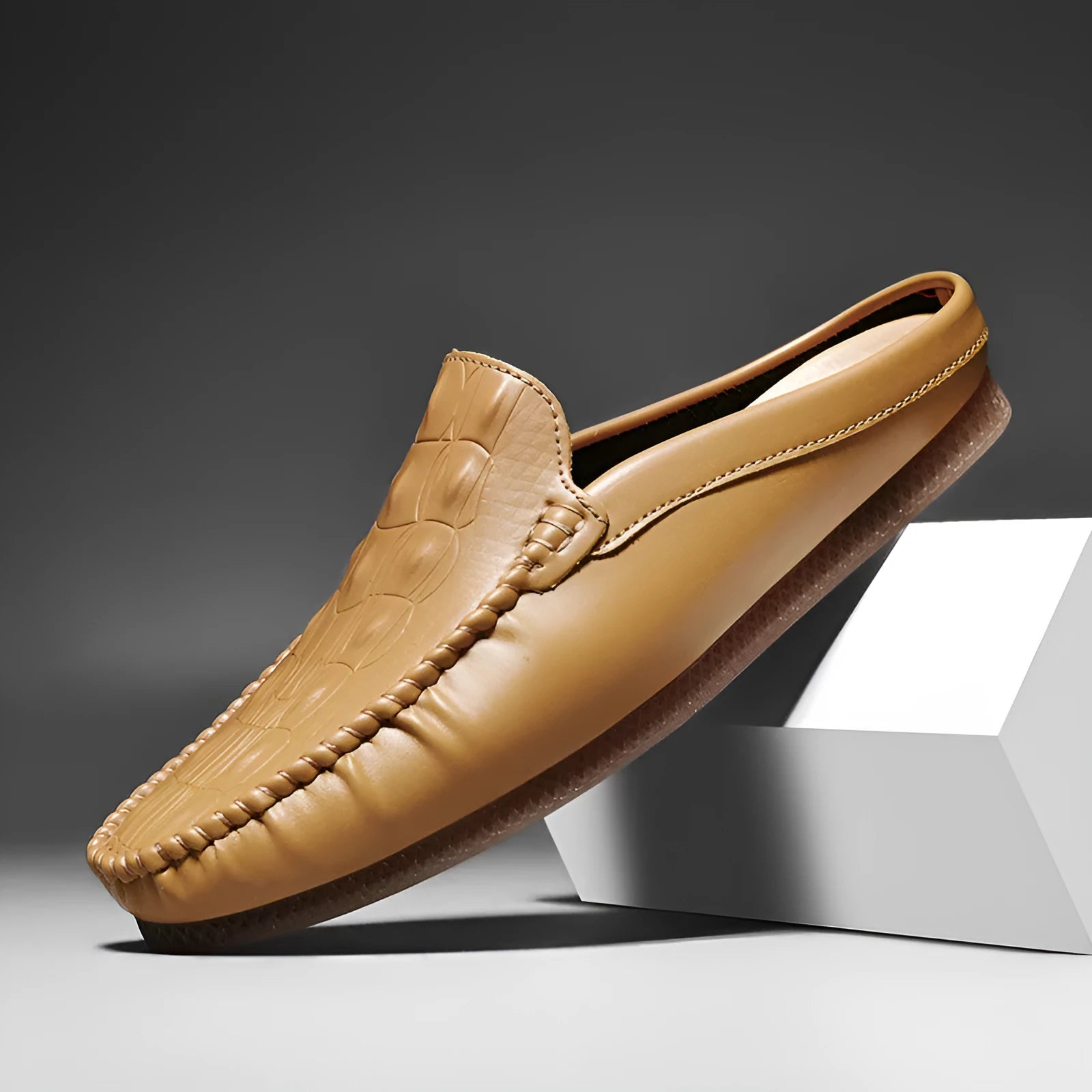 Men's black breathable semi-slippers with an artificial PU upper and rubber sole on a white background.