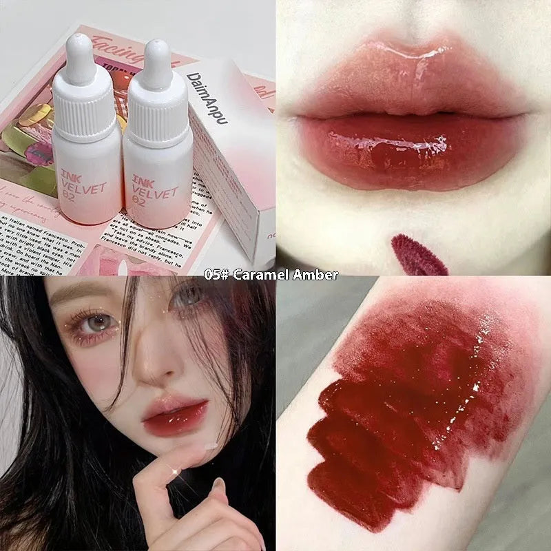 Mirror Lip Lacquer lip gloss tube in one of four shades: Spring Day Wilderness, Orange Tabby Cat Diary, Low-key Charming, or Misty Berry.