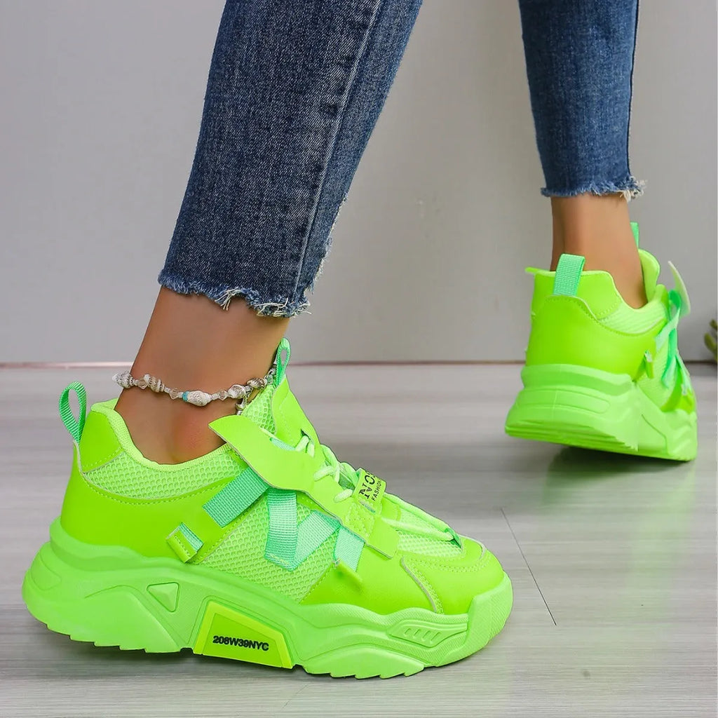 Women's platform mesh sneakers in purple, green, white, pink, and yellow colours with lace-up front.
