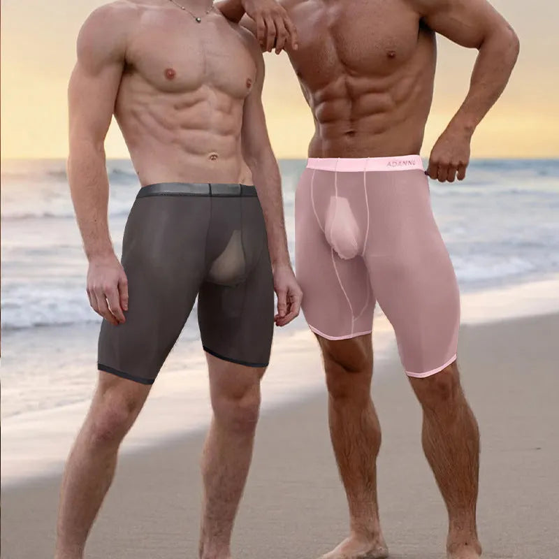 Men's solid colour knitted mesh lounge shorts in black on a hanger.