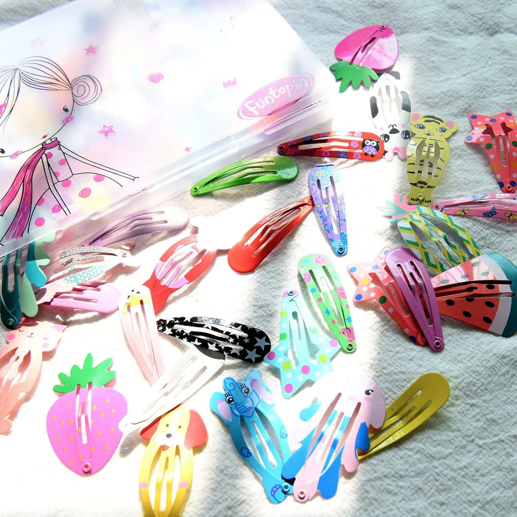 100-piece metal snap hair clips set showing assorted candy colours and cartoon designs including animals, fruits, crowns, and stars