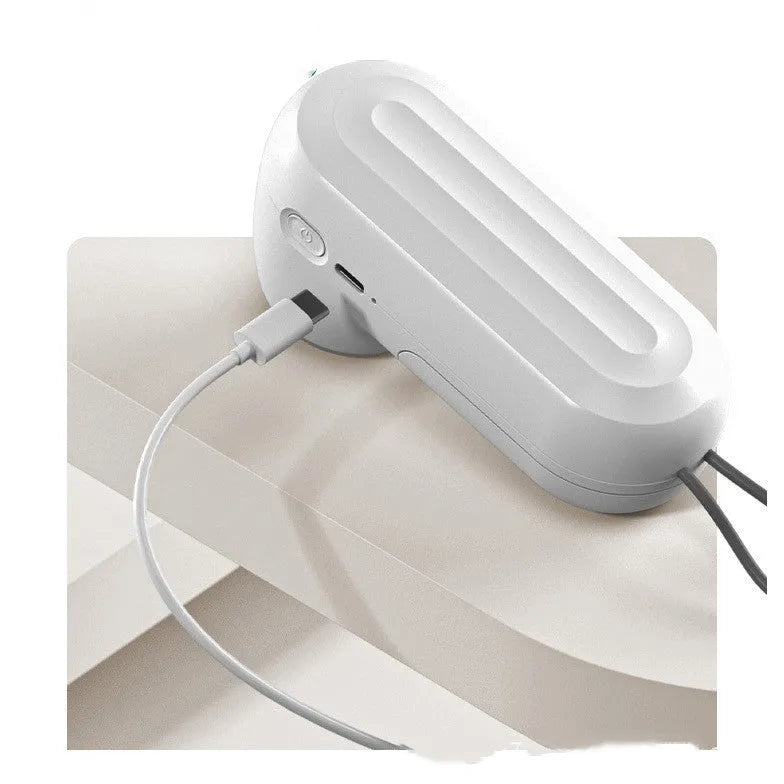 White hand-held vacuum sealing machine with USB charging, compact 54x63x132mm size, ABS plastic construction