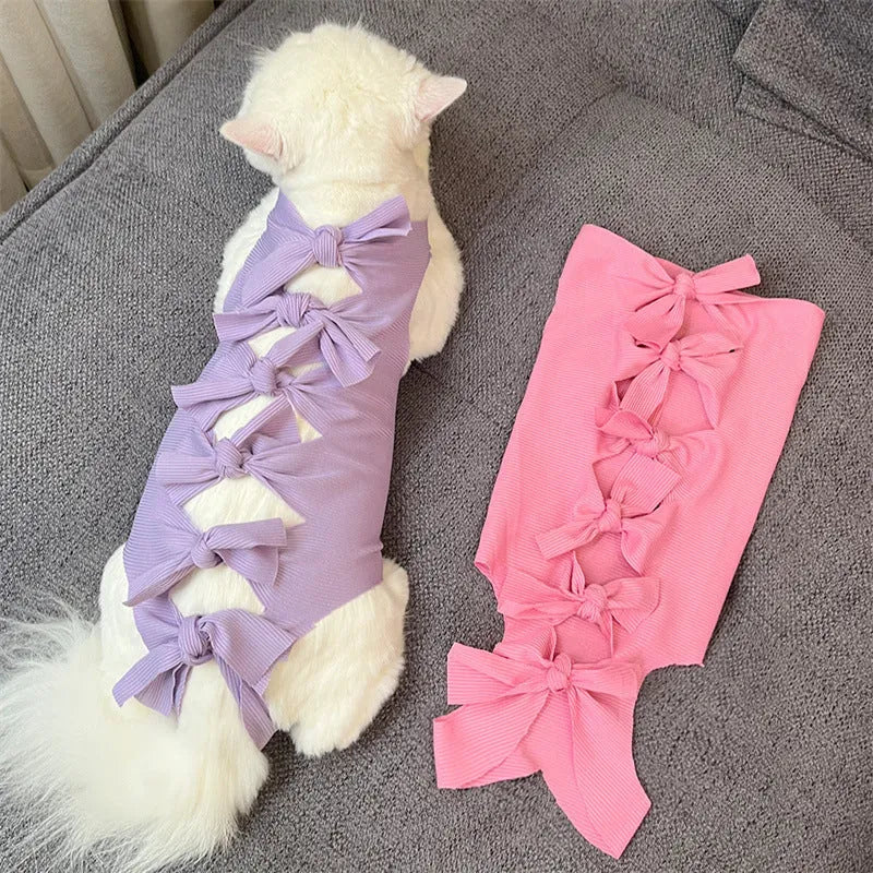 Adjustable lace-up cat sterilisation recovery clothing in polyester fabric showing size and colour options