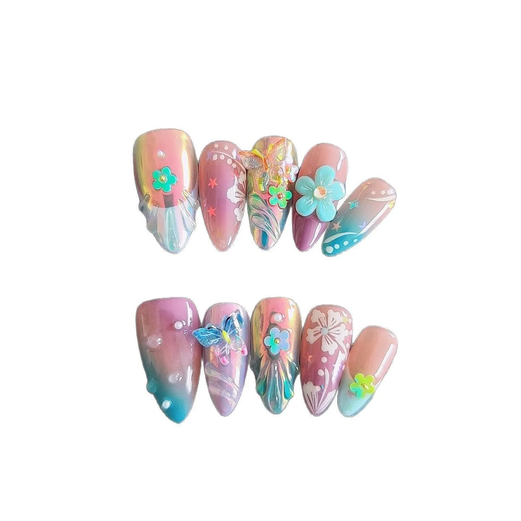 Handmade embossed nail art stickers showing floral and butterfly patterns in almond shape