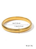 Women's titanium steel elastic bracelet with vertical stripe pattern and ring element in gold finish