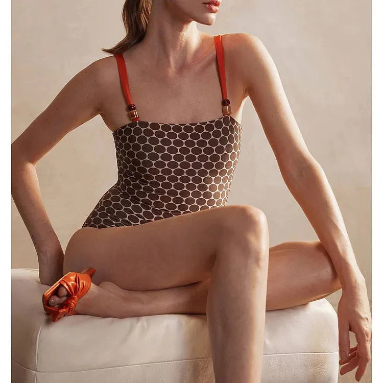 Women's dot pattern one-piece swimsuit with wrap skirt set in polyester fabric