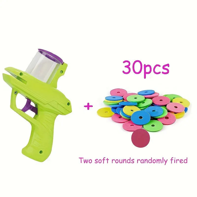 Battery-free interactive cat toy launcher firing foam disc with green and purple colour options