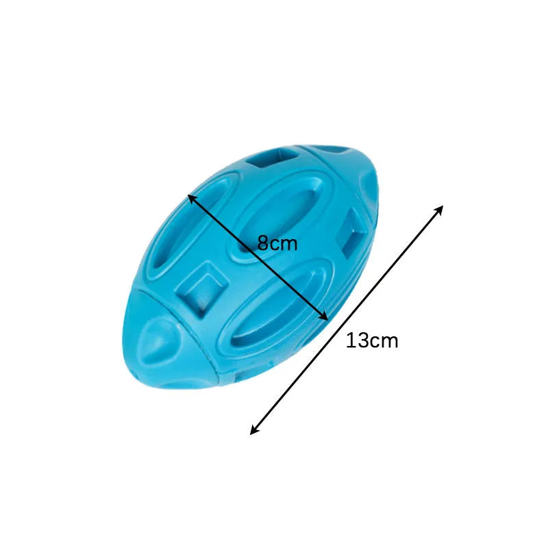Blue, green, and orange natural rubber squeaky dog ball with textured surface grooves for aggressive chewers.