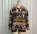 Women's retro style wool coat with Aztec print in Army Green colour showing loose fit and long sleeves
