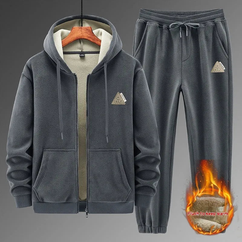 Grey cashmere-blend hooded sweater and matching trousers men's sports suit set on a hanger.