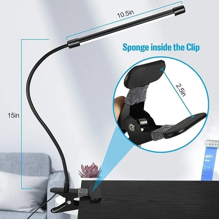 Black and white LED desk lamp with USB cable and 26cm long light bar on a desk.