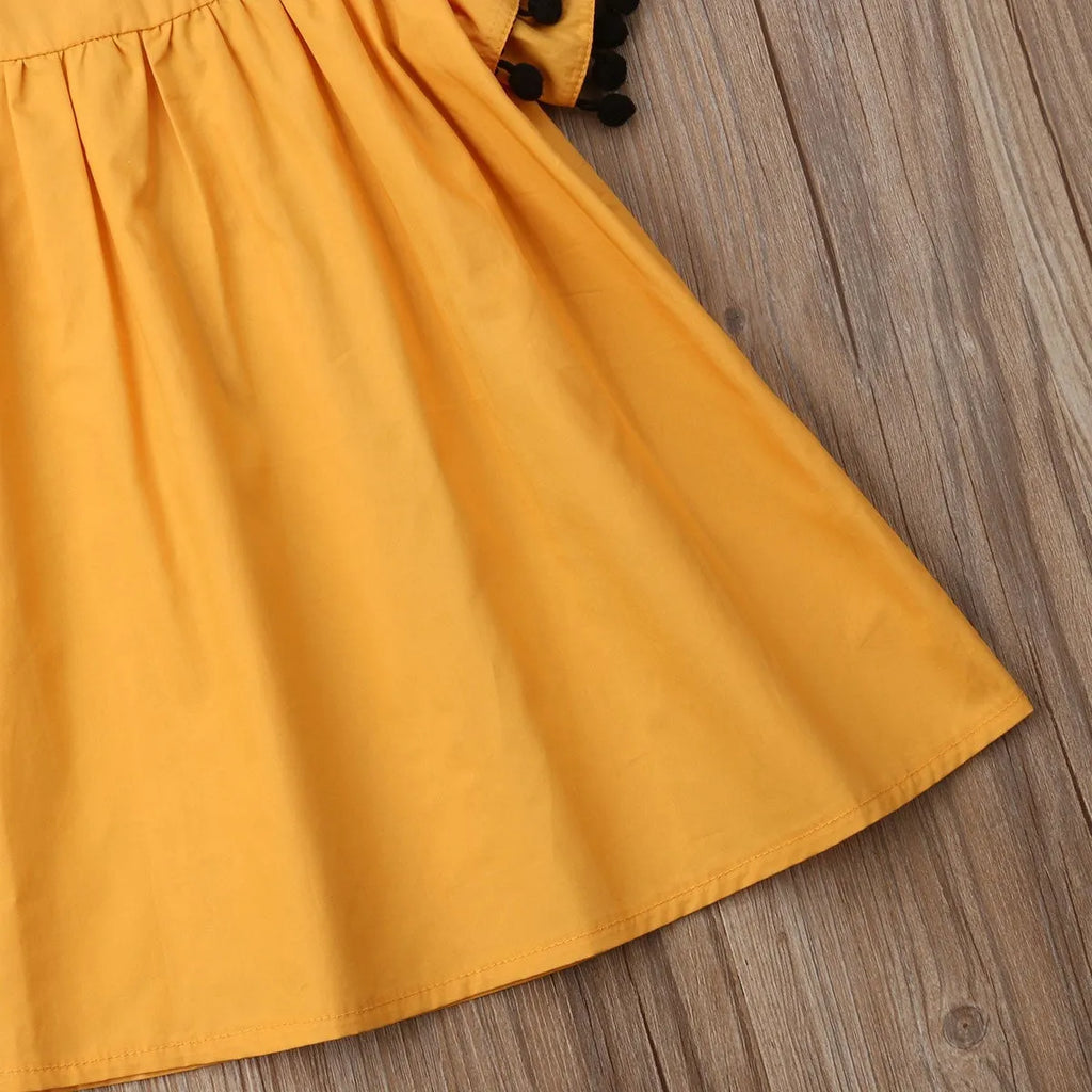 Sleeveless orange girls dress for children ages 3 months to 14 years, sizes 12M to 5T
