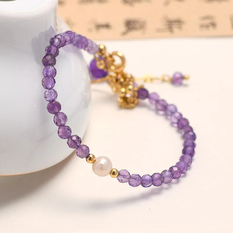 Chinese style women's bracelet with crystal pearls and electroplated amethyst finish